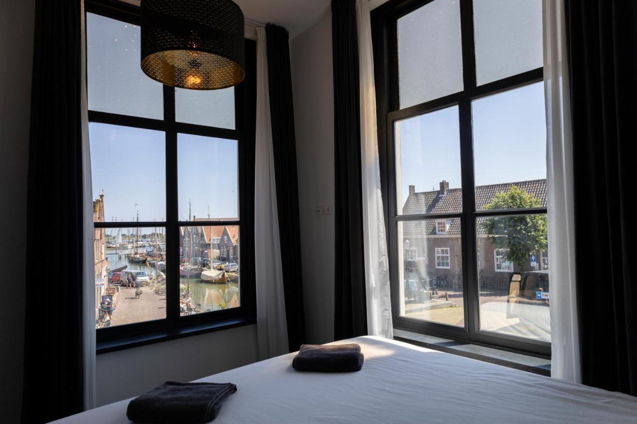 Hotel En Stadscafe De Dam L Hotel Monnickendam Bagian luar foto